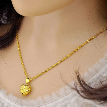 Elegant Heart Shaped Golden Pendant Necklace